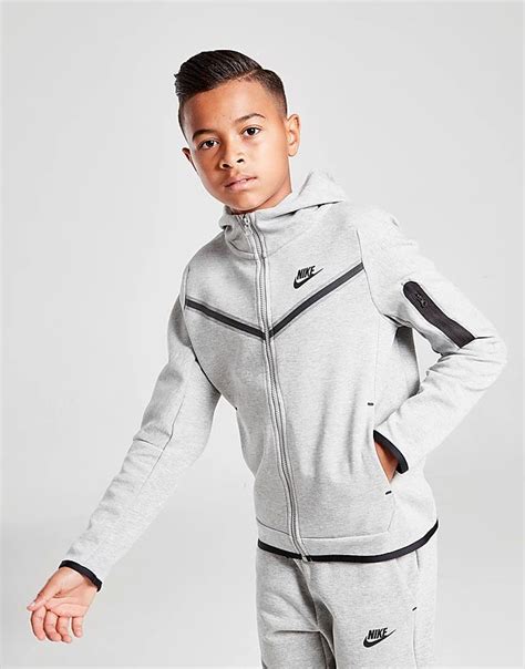 fake nike tech fleece junior|nike tech fleece beige kids.